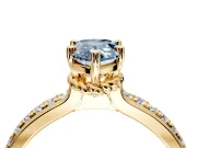 Solitaire Engagement Ring Setting for Fancy Blue Pear-Shaped Center with Raised Channel Band and Prong Head in Yellow Gold
