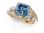 Halo Engagement Ring Setting for Fancy Blue Princess Cut Center with Marquise and Pave Bypass Band and Prong Head in Yellow Gold
