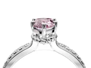 Solitaire Engagement Ring Setting for Fancy Pink Pear-Shaped Center with Raised Channel Band and Prong Head in Platinum
