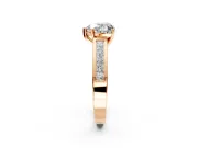 Solitaire Engagement Ring Setting for Heart-Shaped Center with Princess Cut Channel Band and Prong Head in Rose Gold