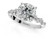 Solitaire Engagement Ring Setting for Round Cut Center with Trailing Leaf Accent Band and Prong Head in Platinum