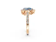 Halo Engagement Ring Setting for Fancy Blue Pear-Shaped Center with Heart-Shaped Openwork, Pave Band and Prong Head in Rose Gold