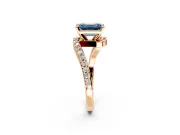 Solitaire Engagement Ring Setting for Fancy Blue Emerald Cut Center with Pave Bypass Swirl Band and Prong Head in Rose Gold