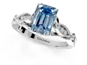 Solitaire Engagement Ring Setting for Fancy Blue Emerald Cut Center with Marquise and Bezel Accents and Prong Head in Platinum