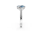 Floral Engagement Ring Setting for Fancy Blue Pear-Shaped Center with Four Accent Clusters and Prong Head in Platinum