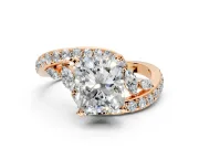 Solitaire Engagement Ring Setting for Radiant Cut Center with Pave Bypass Twist Band and Prong Head in Rose Gold