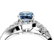 Halo Engagement Ring Setting for Fancy Blue Emerald Cut Center with Marquise and Pave Bypass Band and Prong Head in White Gold