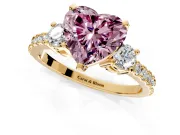 3 Stone Engagement Ring Setting for Fancy Pink Heart-Shaped Center with Round Cut Side Accents and Prong Head in Yellow Gold