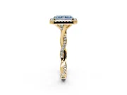 Halo Engagement Ring Setting for Fancy Blue Radiant Cut Center with Twist Band and Prong Head in Yellow Gold