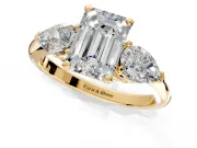 3 Stone Engagement Ring Setting for Emerald Cut Center with Large Pear-Shaped Accents and Prong Head in Yellow Gold