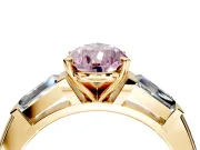 3 Stone Engagement Ring Setting for Fancy Pink Pear-Shaped Center with Tapered Baguettes, Plain Band and Prong Head in Yellow Gold