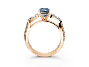 Channel-Set Engagement Ring Setting for Fancy Blue Radiant Cut Center with Baguette Band and Prong Head in Rose Gold