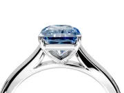 Solitaire Engagement Ring Setting for Fancy Blue Radiant Cut Center with Narrow Cathedral Band and Prong Head in White Gold