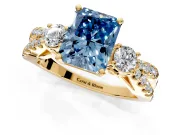 3 Stone Engagement Ring Setting for Fancy Blue Radiant Cut Center with Pave Split Shank and Prong Head in Yellow Gold