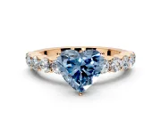 Shared-Prong Engagement Ring Setting for Fancy Blue Heart-Shaped Center with Graduated Accents and Prong Head in Rose Gold