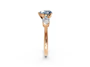 3 Stone Engagement Ring Setting for Fancy Blue Heart-Shaped Center with Large Pear-Shaped Accents and Prong Head in Rose Gold