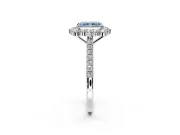 Halo Engagement Ring Setting for Fancy Blue Radiant Cut Center with Single-Row Pave, Open Basket and Prong Head in Platinum