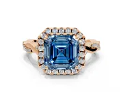 Halo Engagement Ring Setting for Fancy Blue Asscher Cut Center with Twist Band and Prong Head in Rose Gold