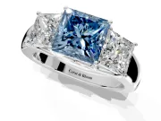 3 Stone Engagement Ring Setting for Fancy Blue Princess Cut Center with Raised Basket Heads and Prong Head in Sterling Silver