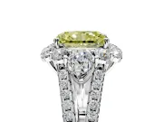 Halo Engagement Ring Setting for Fancy Yellow Radiant Cut Center with Two-Strand Split Shank and Prong Head in Platinum