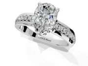 Solitaire Engagement Ring Setting for Pear-Shaped Center with Raised Channel Band and Prong Head in Sterling Silver