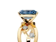 Solitaire Engagement Ring Setting for Fancy Blue Emerald Cut Center with Criss-Cross Accent Band and Prong Head in Yellow Gold