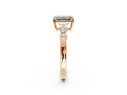 3 Stone Engagement Ring Setting for Emerald Cut Center with Baguette Accents and Prong Head in Rose Gold