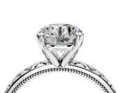 Solitaire Engagement Ring Setting for Round Cut Center with XO Engraved Band and Prong Head in Platinum