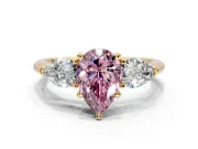 3 Stone Engagement Ring Setting for Fancy Pink Pear-Shaped Center with Large Pear-Shaped Accents and Prong Head in Yellow Gold