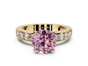 Solitaire Engagement Ring Setting for Fancy Pink Round Cut Center with Channel-Set Accents and Prong Head in Yellow Gold