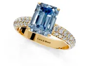 Solitaire Engagement Ring Setting for Fancy Blue Emerald Cut Center with Domed Multi-Row Pave Band and Prong Head in Yellow Gold