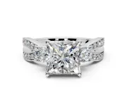 3 Stone Engagement Ring Setting for Princess Cut Center with Pave Twist Band and Prong Head in White Gold