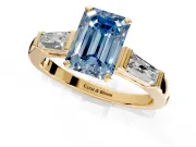 3 Stone Engagement Ring Setting for Fancy Blue Emerald Cut Center with Tapered Baguettes, Plain Band and Prong Head in Yellow Gold