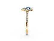 Halo Engagement Ring Setting for Fancy Blue Heart-Shaped Center with Narrowing Pave Band and Prong Head in Yellow Gold