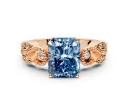 Leaf Engagement Ring Setting for Fancy Blue Radiant Cut Center with Milgrain Accent Band and Prong Head in Rose Gold