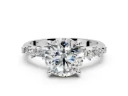 Solitaire Engagement Ring Setting for Round Cut Center with Trailing Leaf Accent Band and Prong Head in Platinum
