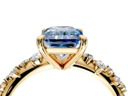 Solitaire Engagement Ring Setting for Fancy Blue Radiant Cut Center with Trailing Leaf Accent Band and Prong Head in Yellow Gold