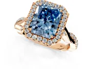 Halo Engagement Ring Setting for Fancy Blue Radiant Cut Center with Twist Band and Prong Head in Rose Gold