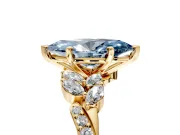 Solitaire Engagement Ring Setting for Fancy Blue Marquise Center with Marquise Accent Twist Band and Prong Head in Yellow Gold
