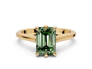 Solitaire Engagement Ring Setting for Fancy Green Emerald Cut Center with Cathedral Band and Prong Head in Yellow Gold