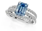 Solitaire Engagement Ring Setting for Fancy Blue Emerald Cut Center with Woven 3-Strand Pave Band and Prong Head in White Gold