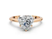 Solitaire Engagement Ring Setting for Heart-Shaped Center with Knife Ridge Band and Claw Prong Head in Rose Gold