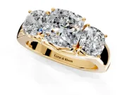 3 Stone Engagement Ring Setting for Cushion Cut Center with Raised Basket Heads and Prong Head in Yellow Gold