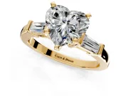 3 Stone Engagement Ring Setting for Heart-Shaped Center with Channel Baguette Accents and Prong Head in Yellow Gold