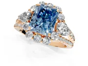 Halo Engagement Ring Setting for Fancy Blue Radiant Cut Center with Two-Strand Split Shank and Prong Head in Rose Gold