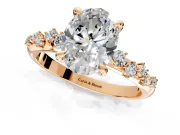 Solitaire Engagement Ring Setting for Oval Center with Trailing Leaf Accent Band and Prong Head in Rose Gold