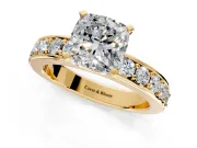 Solitaire Engagement Ring Setting for Cushion Cut Center with Channel-Set Accents and Prong Head in Yellow Gold