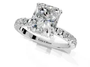 Solitaire Engagement Ring Setting for Radiant Cut Center with Band of Accents and Prong Head in Platinum