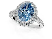 Halo Engagement Ring Setting for Fancy Blue Oval Center with Narrowing Pave Band and Prong Head in White Gold