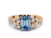 Cluster Engagement Ring Setting for Fancy Blue Emerald Cut Center with Bezel Accent Clusters and Prong Head in Rose Gold